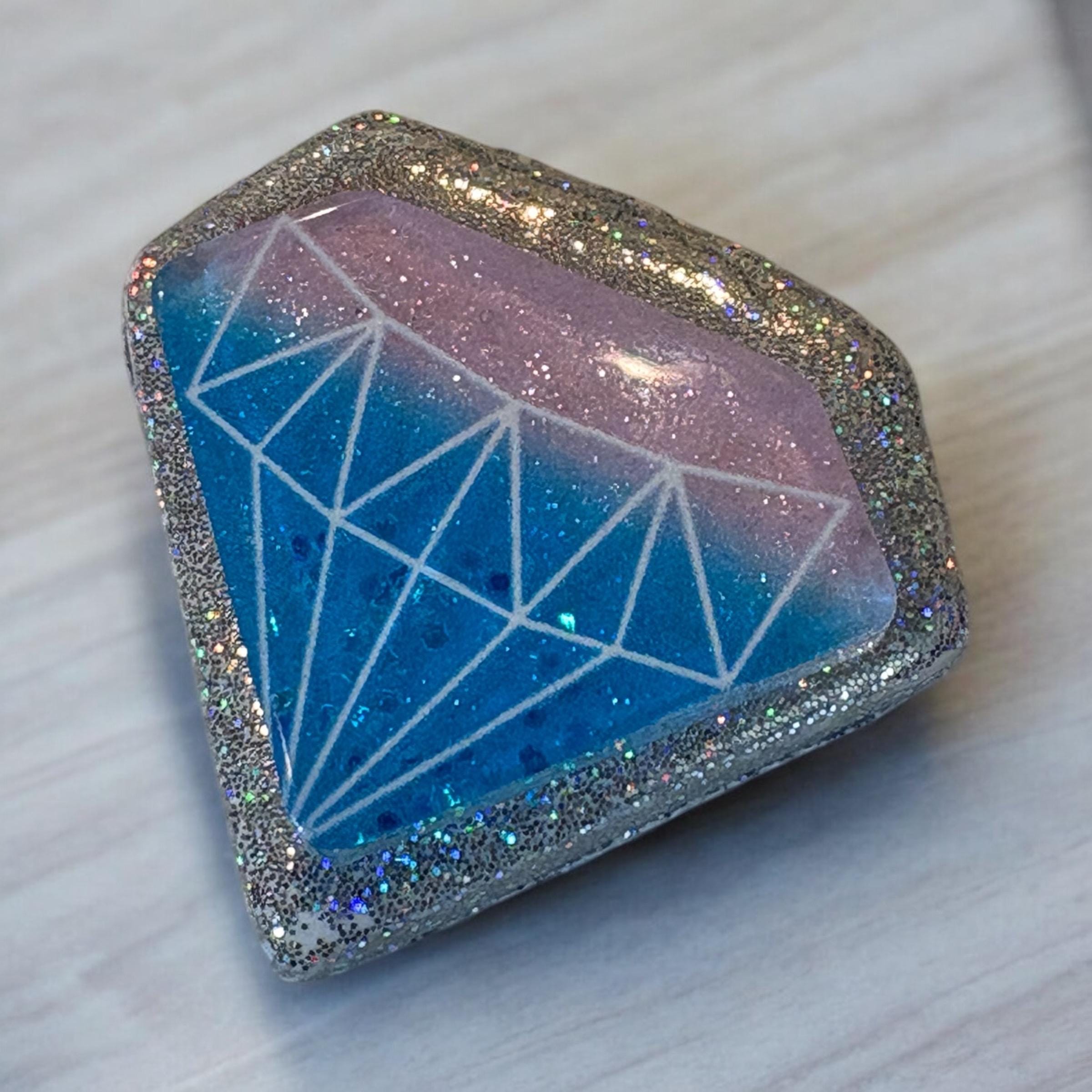 Geometric design on a glittery case with a blue and pink gradient